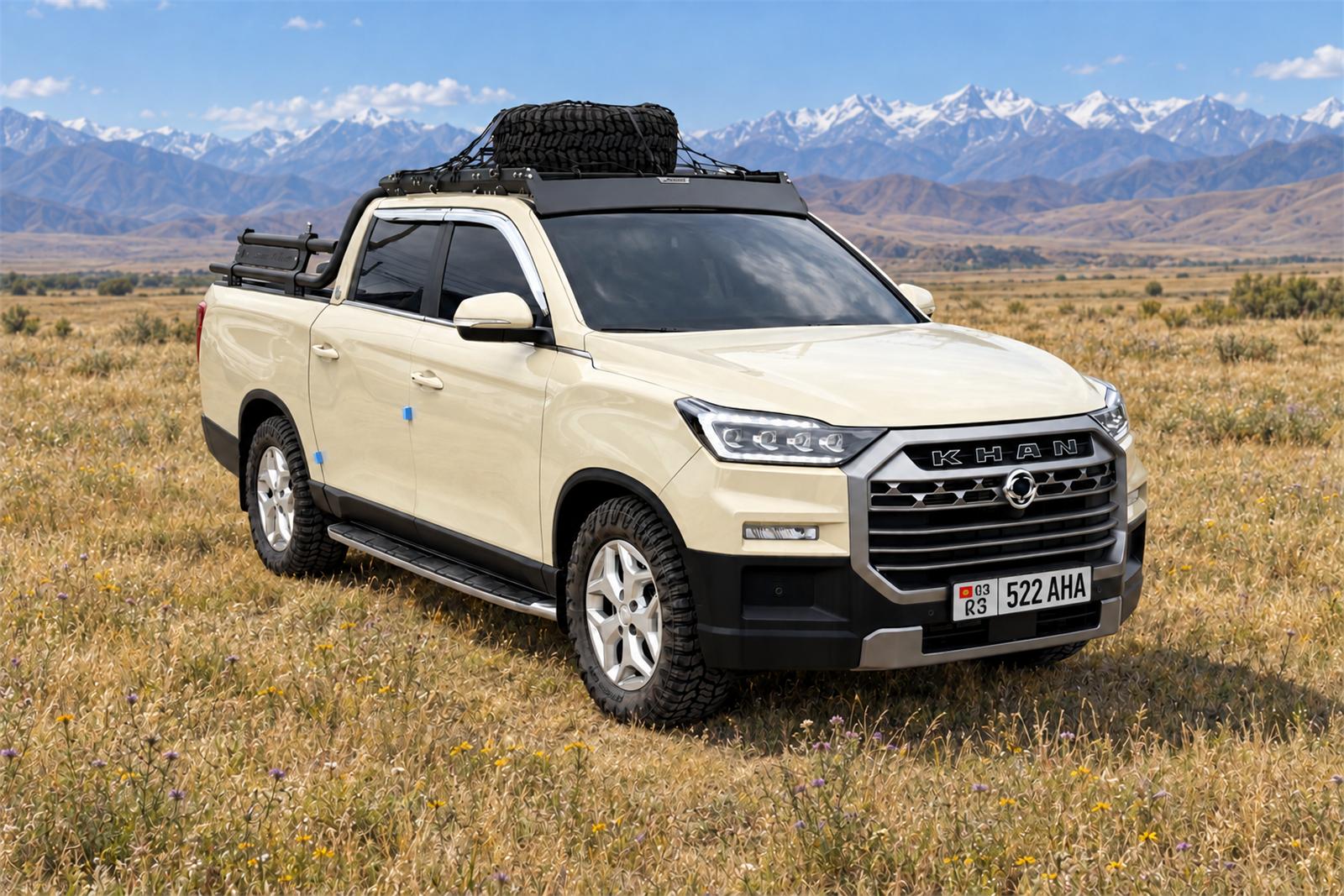Аренда пикапа KGM Rexton Sports Khan 2024 песочного цвета в Бишкеке — в поле